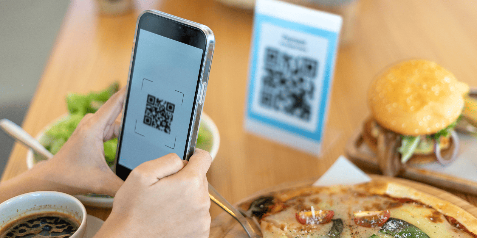 From Analog to Digital: Embracing QR Codes and NFC in Signage